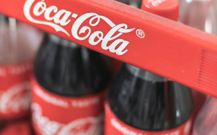 Coca-Cola bottles in a red Coca-Cola crate